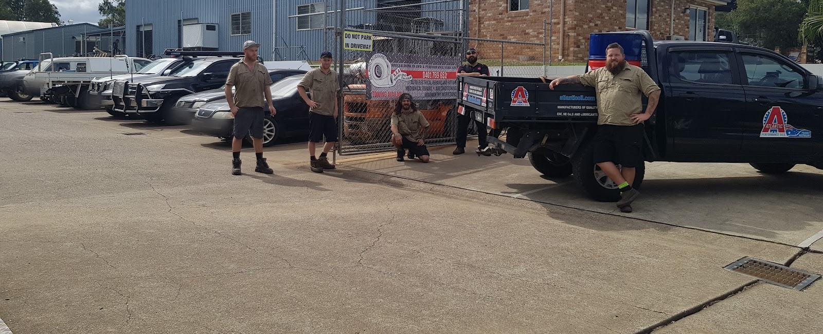 The AAA Repairs and Electrical team outside the workshop